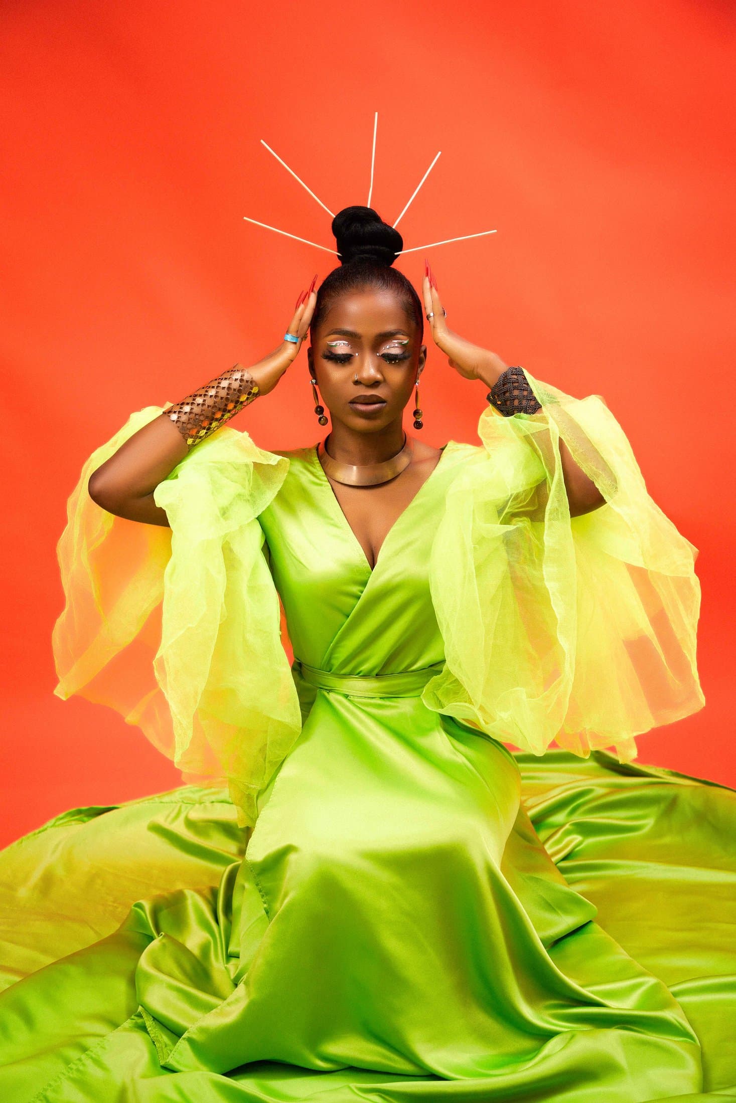Chartreuse silk on tangerine, wired gold spike halo, glitter eye